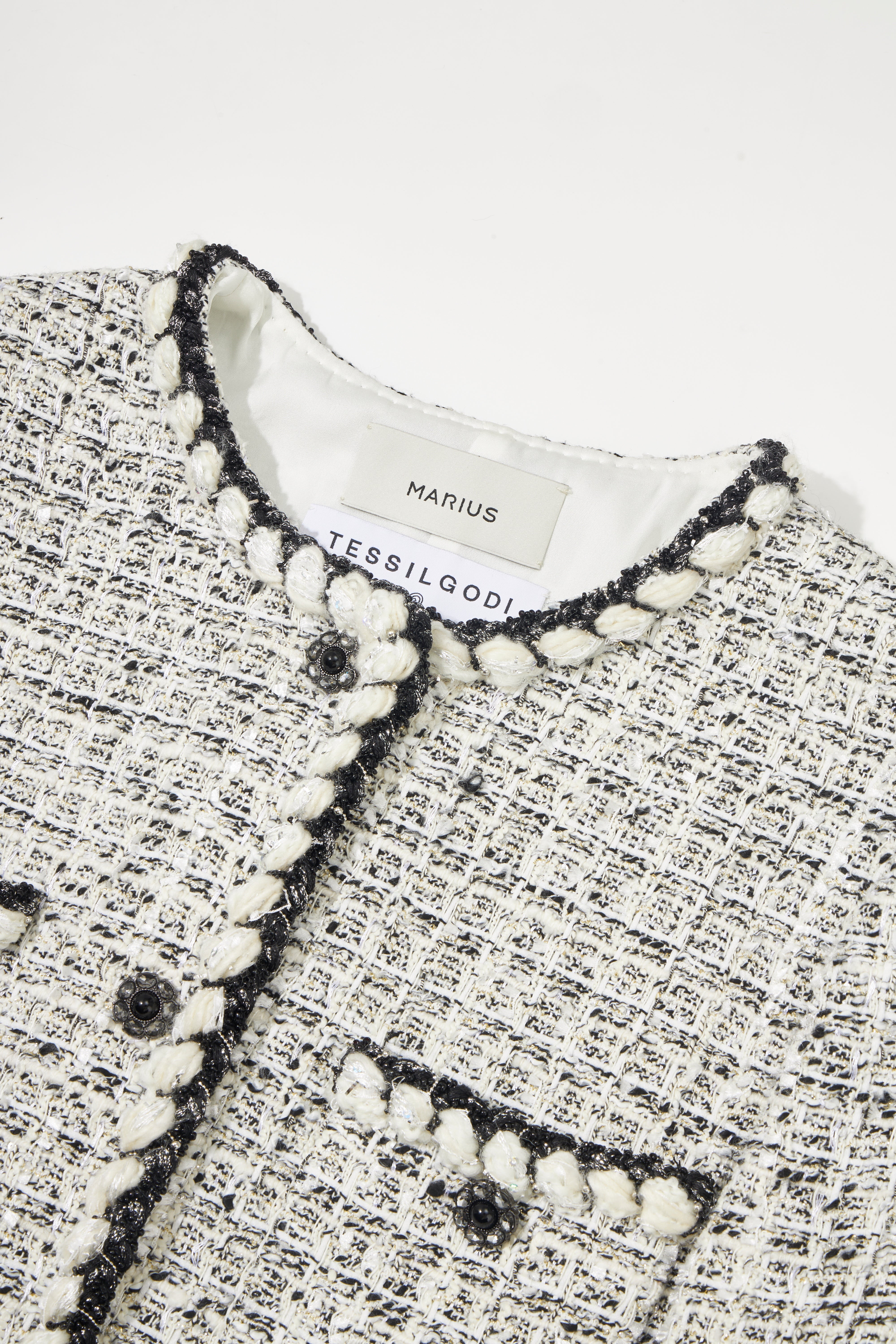 Refined Tweed Jacket with Fringe Trim